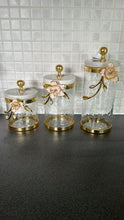 Load image into Gallery viewer, Hammered Glass Canister with White Enamel and Gold Leaf Flower, Marble Lid with Gold knob (3 sizes)